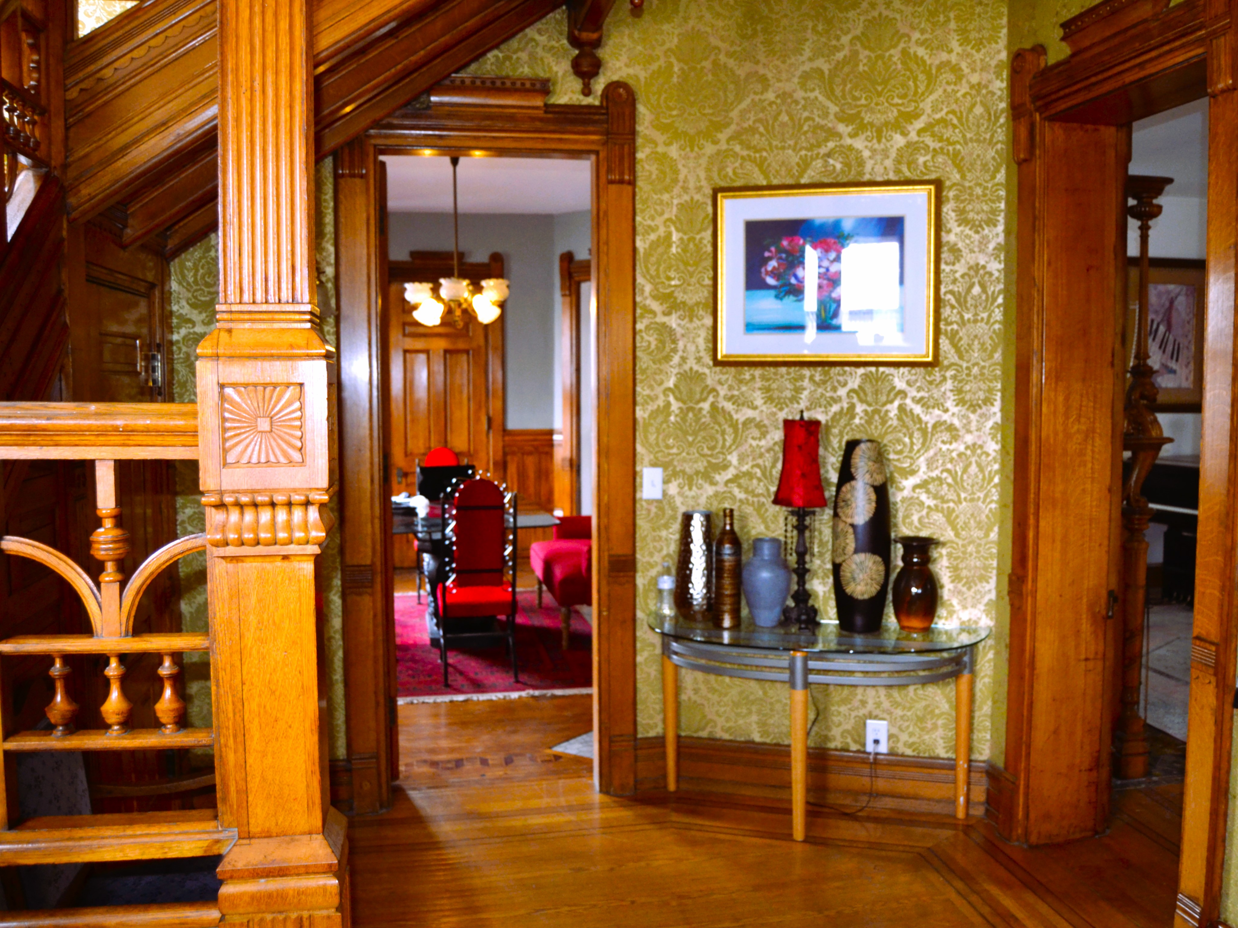 Main staircase and historic woodwork at Legg House Inn